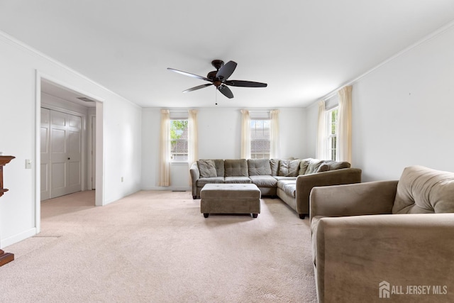 104 Glenwood Ln Unit A, Monroe, NJ 08831 - living room featuring a ceiling fan, light colored carpet, crown molding, and baseboards