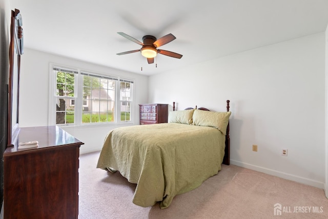 104 Glenwood Ln Unit A, Monroe, NJ 08831 - bedroom featuring light colored carpet, baseboards, and a ceiling fan