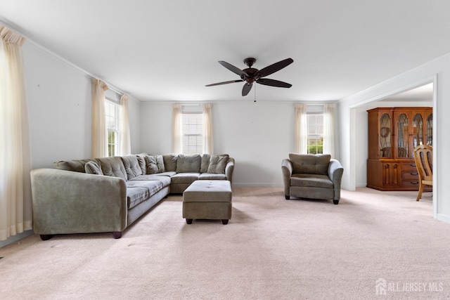 104 Glenwood Ln Unit A, Monroe, NJ 08831 - living area with healthy amount of natural light, a ceiling fan, light colored carpet, and baseboards
