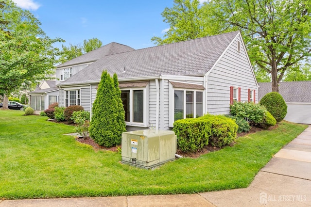 104 Glenwood Ln Unit A, Monroe, NJ 08831 - view of home's exterior with a yard