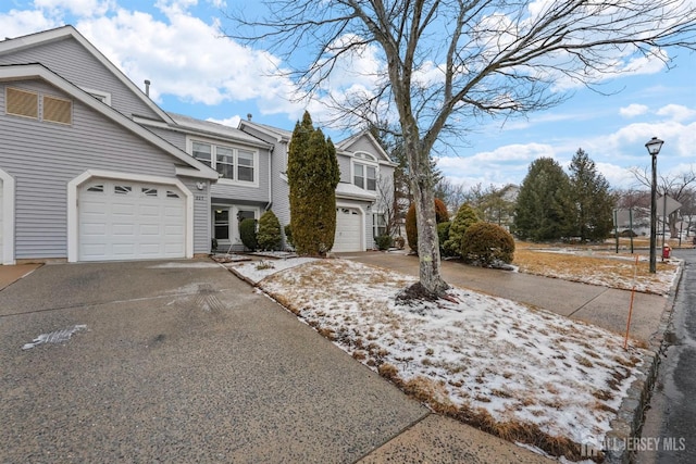 exterior space featuring concrete driveway