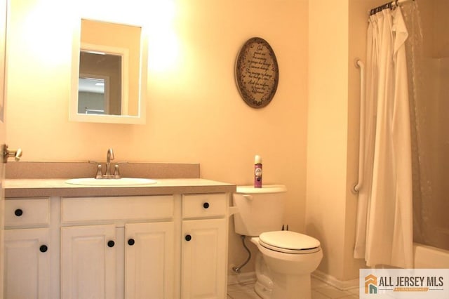 100 John T O Leary Blvd Unit 311, South Amboy, NJ 08879 - bathroom with vanity, toilet, tile patterned floors, and shower / tub combo