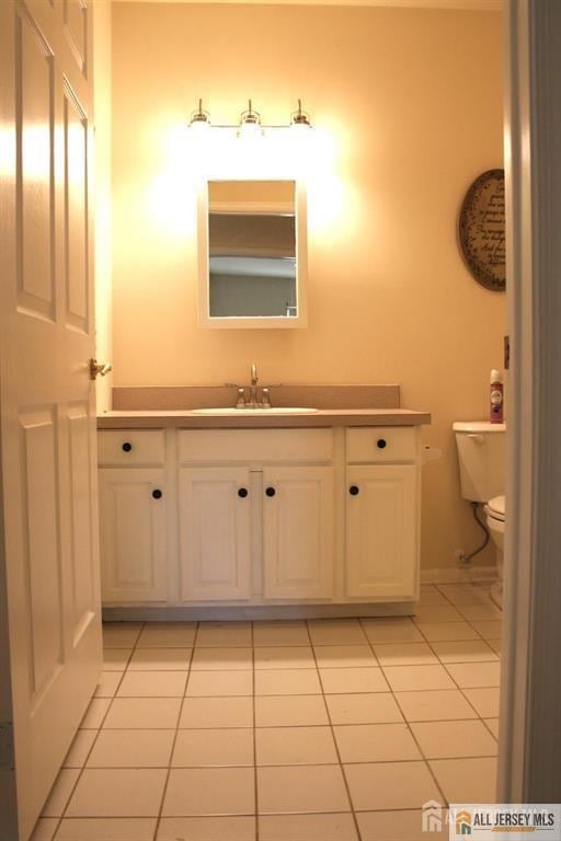 100 John T O Leary Blvd Unit 311, South Amboy, NJ 08879 - bathroom with vanity, tile patterned floors, and toilet