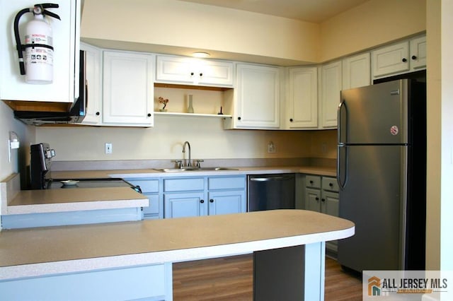 100 John T O Leary Blvd Unit 311, South Amboy, NJ 08879 - kitchen featuring freestanding refrigerator, a sink, stove, dishwashing machine, and open shelves