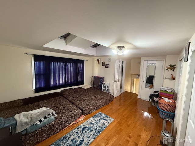 bedroom with wood-type flooring