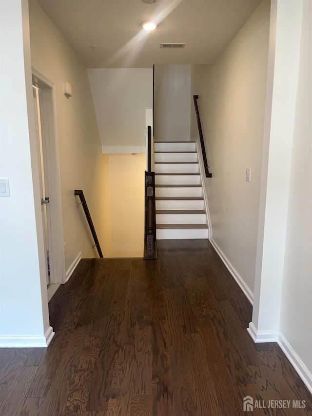 1425 Hudson Cir, Highland Park, NJ 08904 - staircase featuring wood finished floors and baseboards