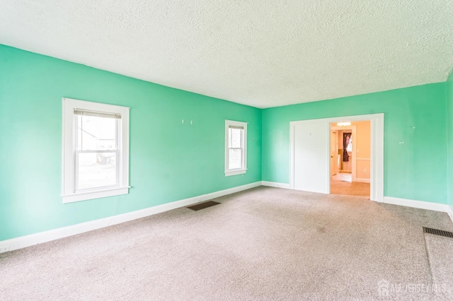 55 Leland Ave, Plainfield, NJ 07062 - spare room featuring a textured ceiling and carpet floors