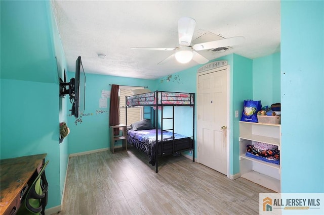 53 Second St, Edison, NJ 08837 - bedroom with wood finished floors and a ceiling fan