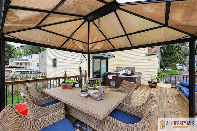 53 Second St, Edison, NJ 08837 - wooden terrace featuring a gazebo, a hot tub, and outdoor dining area