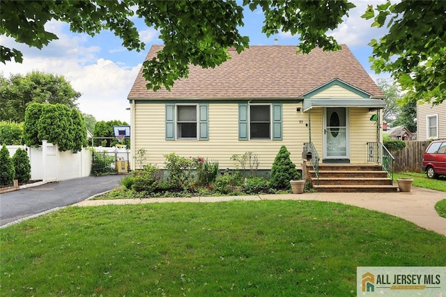 53 Second St, Edison, NJ 08837 - view of front of home featuring roof with shingles and asphalt driveway