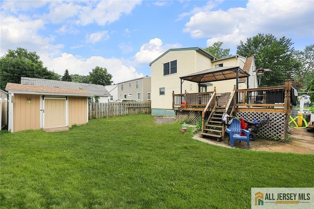 53 Second St, Edison, NJ 08837 - fenced backyard with a gazebo, a deck, and a storage shed
