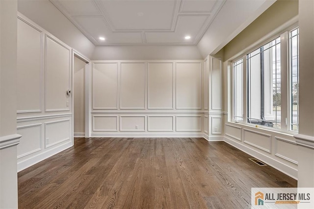 empty room with hardwood / wood-style flooring