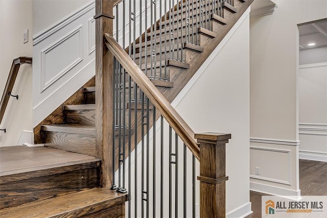 stairs with hardwood / wood-style flooring