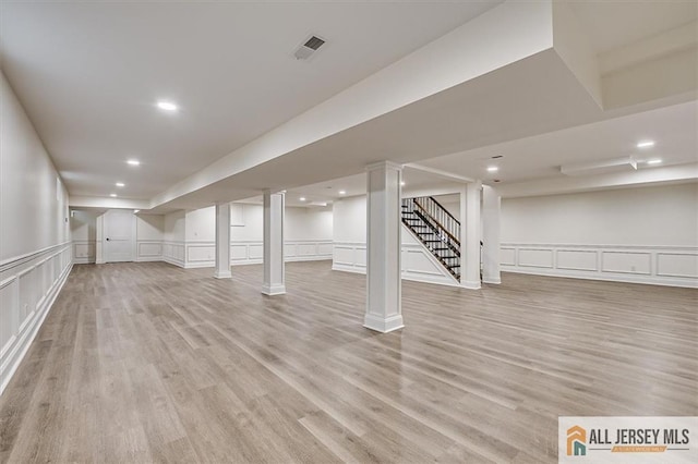 basement with light wood-type flooring