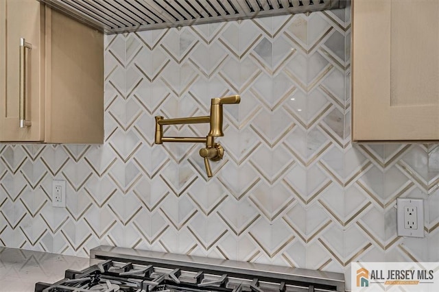 kitchen featuring cream cabinets