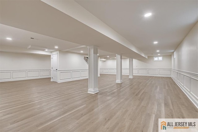 basement with light wood-type flooring