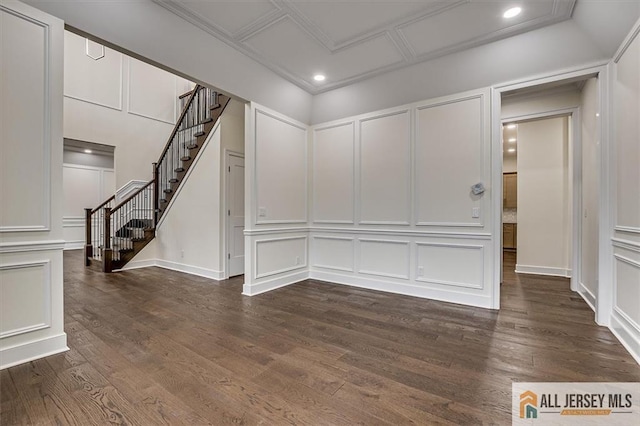 spare room featuring dark wood-type flooring