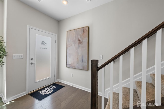 1305 Parker Blvd, West Windsor, NJ 08550 - foyer featuring dark wood-style flooring, stairway, and baseboards