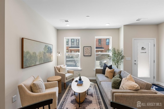 1305 Parker Blvd, West Windsor, NJ 08550 - living room featuring baseboards and wood finished floors