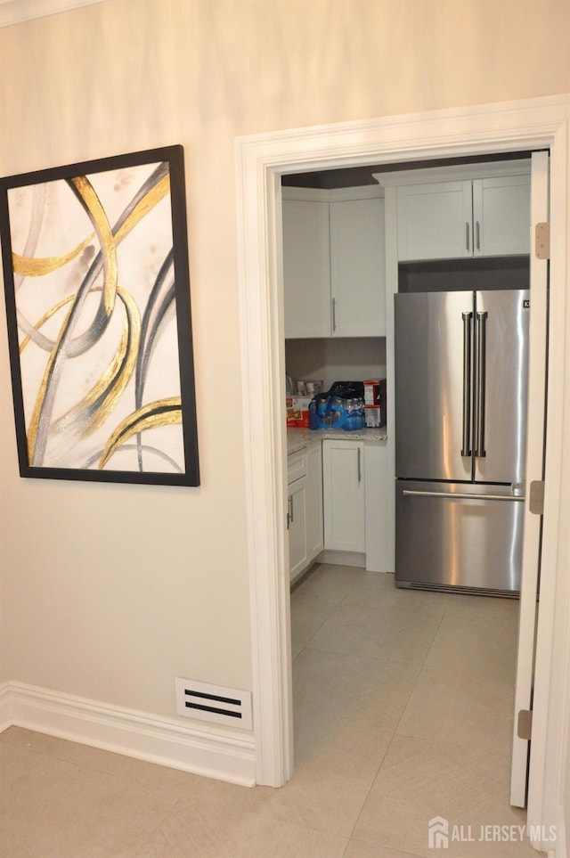 260 Church Ln, North Brunswick, NJ 08902 - kitchen featuring high end refrigerator, light tile patterned flooring, and light countertops