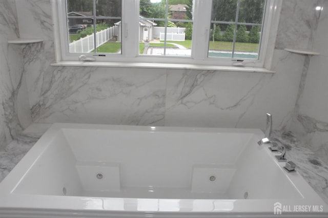 260 Church Ln, North Brunswick, NJ 08902 - full bath featuring healthy amount of natural light and a jetted tub