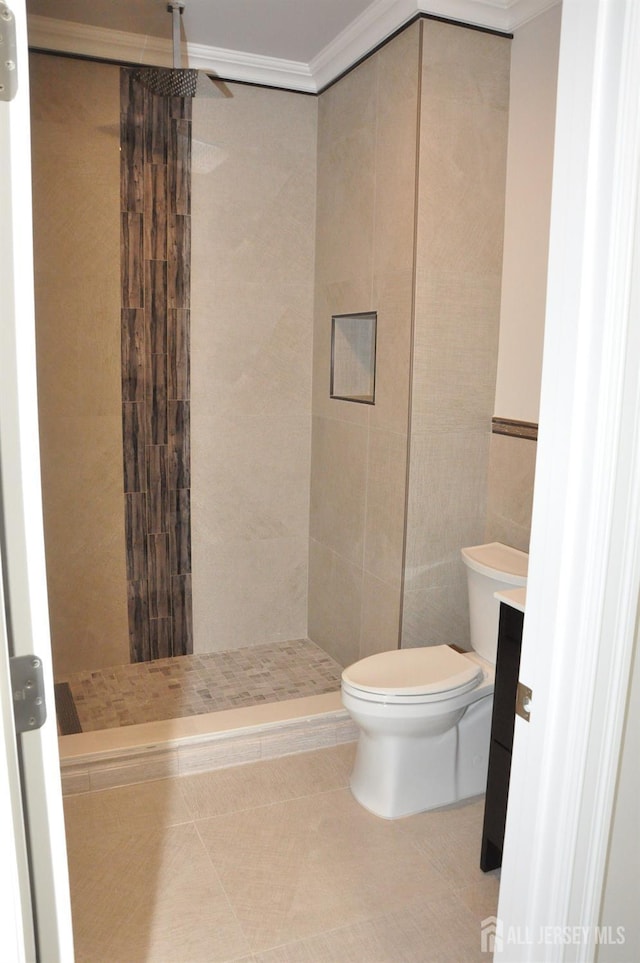 260 Church Ln, North Brunswick, NJ 08902 - bathroom with toilet, ornamental molding, a stall shower, tile walls, and tile patterned flooring