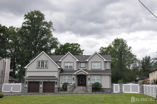 260 Church Ln, North Brunswick, NJ 08902 - traditional-style home with a gate, stucco siding, and stone siding