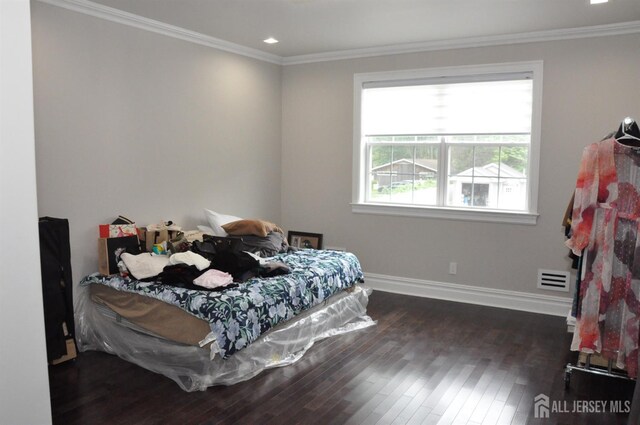 260 Church Ln, North Brunswick, NJ 08902 - bedroom with dark wood-style flooring, crown molding, baseboards, and recessed lighting