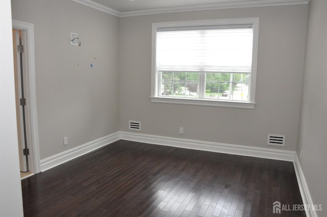 260 Church Ln, North Brunswick, NJ 08902 - spare room featuring dark wood-style flooring and crown molding