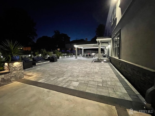 260 Church Ln, North Brunswick, NJ 08902 - patio at night featuring a patio area