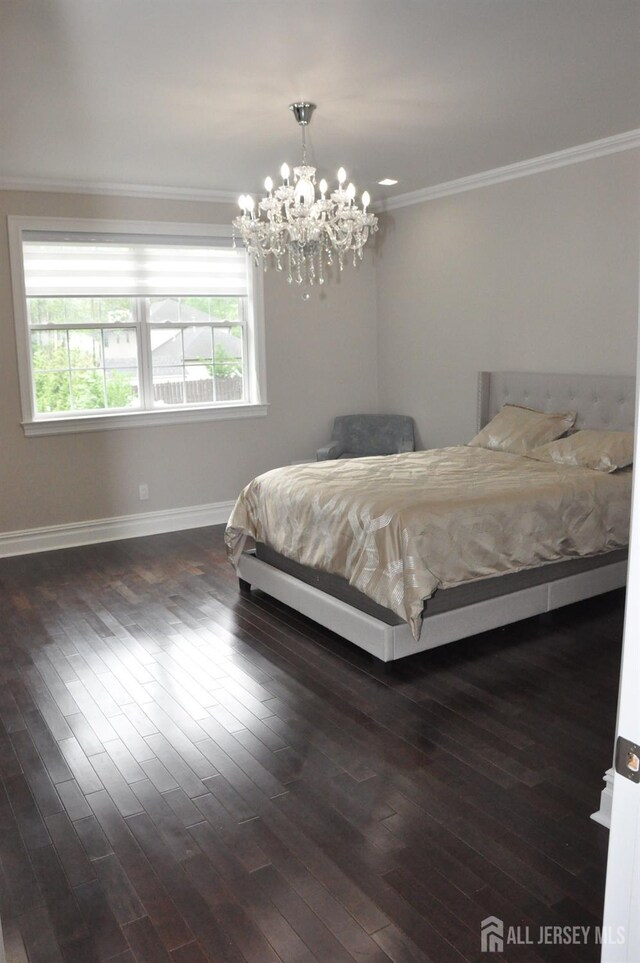 260 Church Ln, North Brunswick, NJ 08902 - bedroom featuring crown molding, dark wood-style flooring, and a chandelier