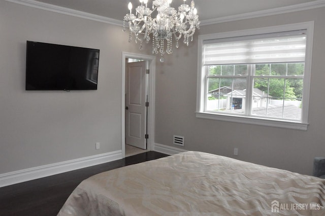 260 Church Ln, North Brunswick, NJ 08902 - bedroom featuring baseboards, a chandelier, wood finished floors, and ornamental molding