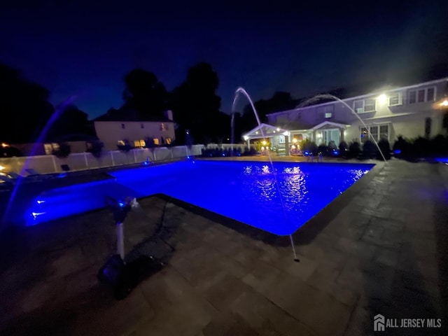260 Church Ln, North Brunswick, NJ 08902 - pool at twilight with a patio area