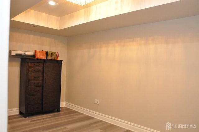 260 Church Ln, North Brunswick, NJ 08902 - unfurnished bedroom with baseboards and wood finished floors