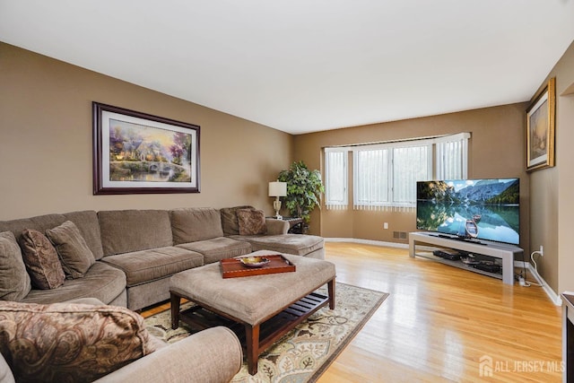 415 Spotswood Englishtown Rd, Monroe, NJ 08831 - living room featuring light wood-style floors and baseboards