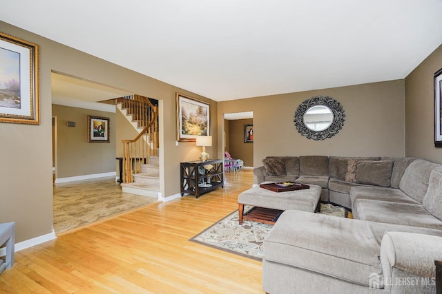 415 Spotswood Englishtown Rd, Monroe, NJ 08831 - living area with light wood-style floors, stairway, and baseboards