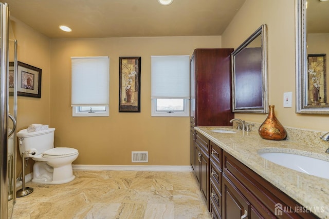 415 Spotswood Englishtown Rd, Monroe, NJ 08831 - bathroom with toilet, baseboards, double vanity, and recessed lighting