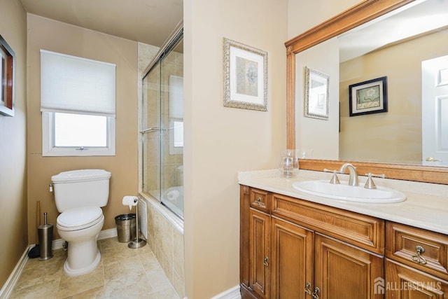 415 Spotswood Englishtown Rd, Monroe, NJ 08831 - full bathroom with toilet, tiled shower / bath, vanity, tile patterned floors, and baseboards