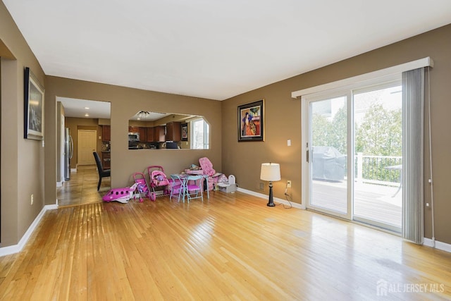 415 Spotswood Englishtown Rd, Monroe, NJ 08831 - rec room with light wood-style floors and baseboards