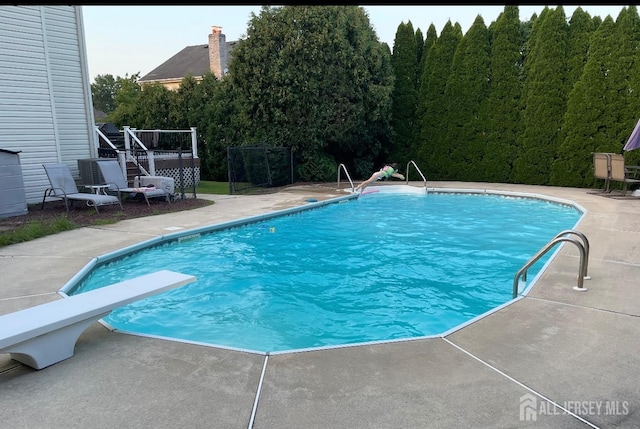 415 Spotswood Englishtown Rd, Monroe, NJ 08831 - outdoor pool featuring a patio area, stairs, and a diving board