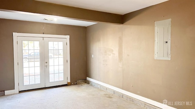 empty room featuring a wealth of natural light, electric panel, french doors, and beamed ceiling