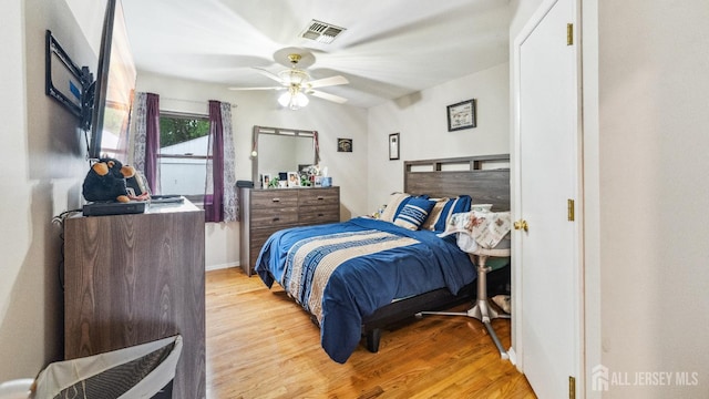 587 Malboro Rd, Old Bridge, NJ 08857 - bedroom with light wood-style flooring and ceiling fan