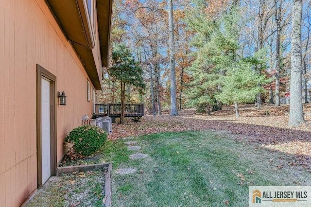 view of yard with a deck