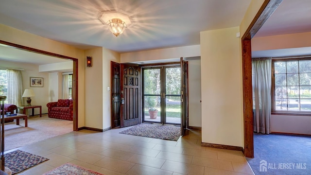 9 Toby Ter, Monroe, NJ 08831 - foyer featuring baseboards, french doors, and carpet flooring