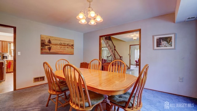 9 Toby Ter, Monroe, NJ 08831 - dining space with a chandelier, light colored carpet, stairway, and baseboards