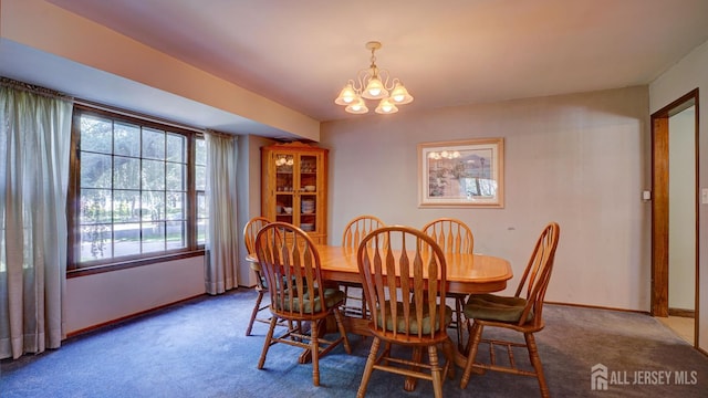 9 Toby Ter, Monroe, NJ 08831 - carpeted dining area featuring a chandelier and baseboards