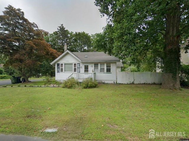 1009 Old Corlies Ave, Neptune, NJ 07753 - view of front of property with a chimney