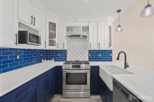 77 Winthrop Rd Unit C, Monroe Township, NJ 08331 - kitchen featuring wall chimney range hood, appliances with stainless steel finishes, white cabinets, and a sink