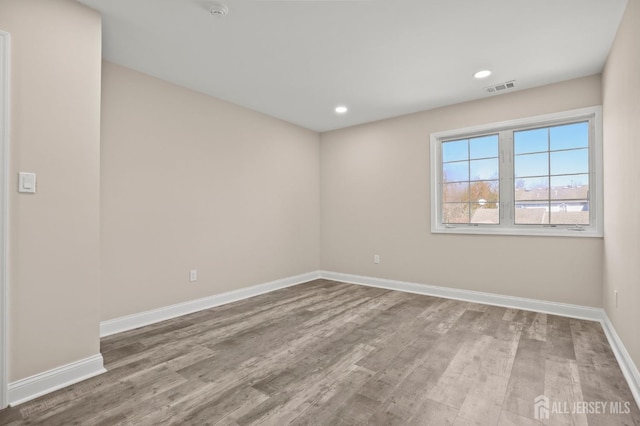 77 Winthrop Rd Unit C, Monroe Township, NJ 08331 - empty room with visible vents, recessed lighting, baseboards, and wood finished floors