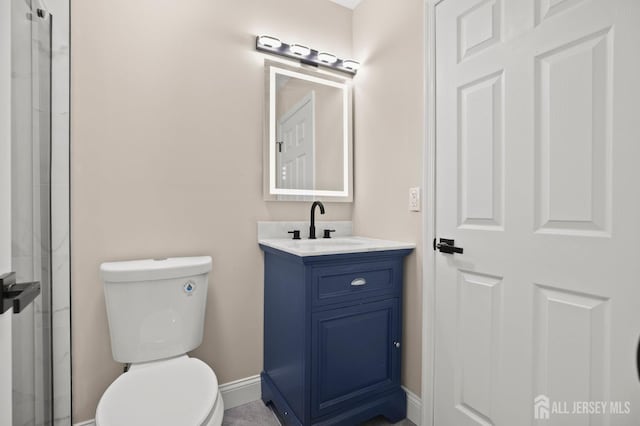 77 Winthrop Rd Unit C, Monroe Township, NJ 08331 - bathroom featuring baseboards, an enclosed shower, toilet, and vanity